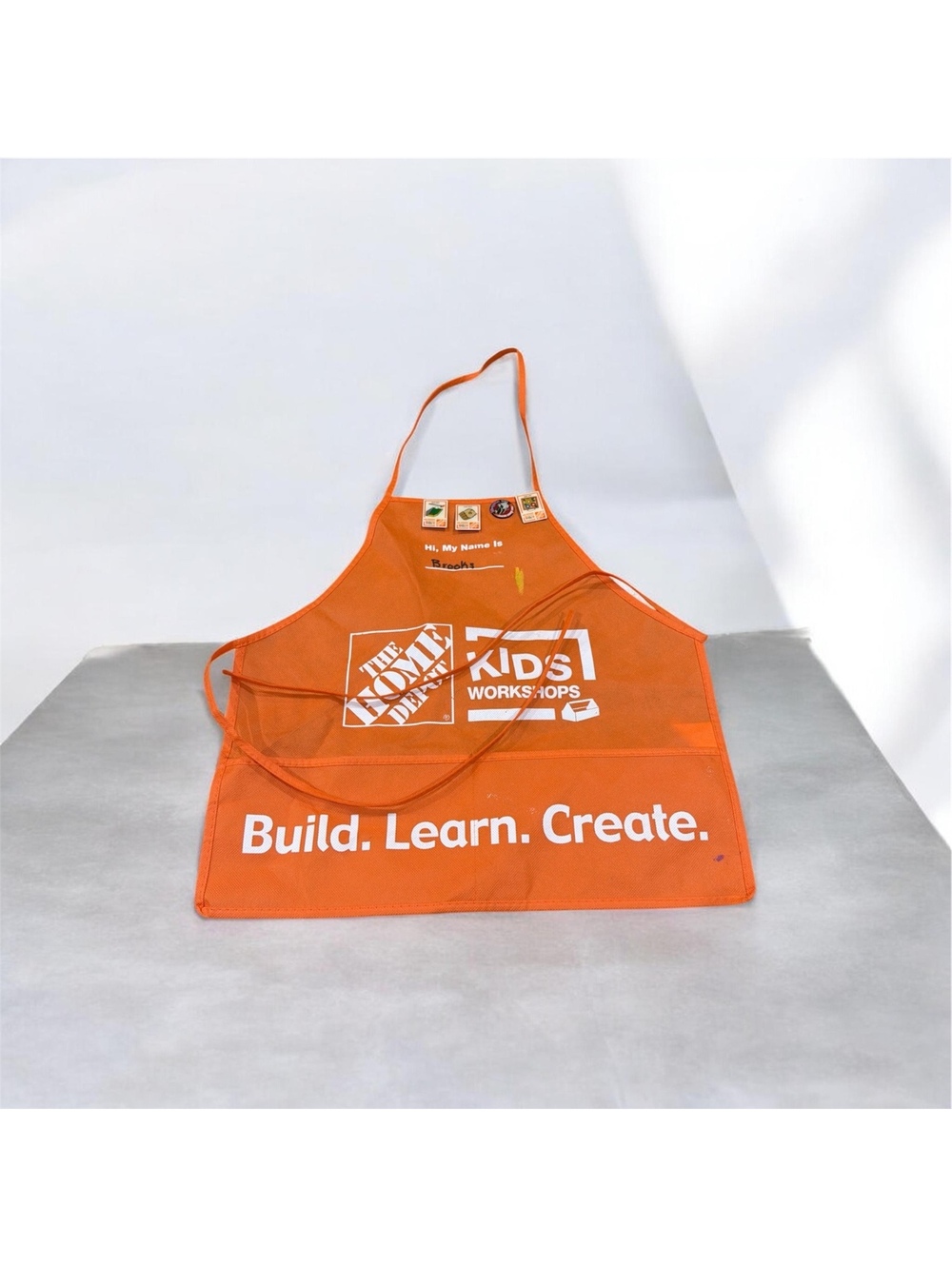 The Home Depot Kids Workshops Orange Apron with Pins